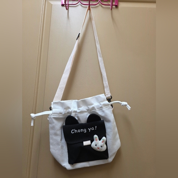 Handbags - Brand New White Canvas Drawstring Crossbody Bag with Black Accent